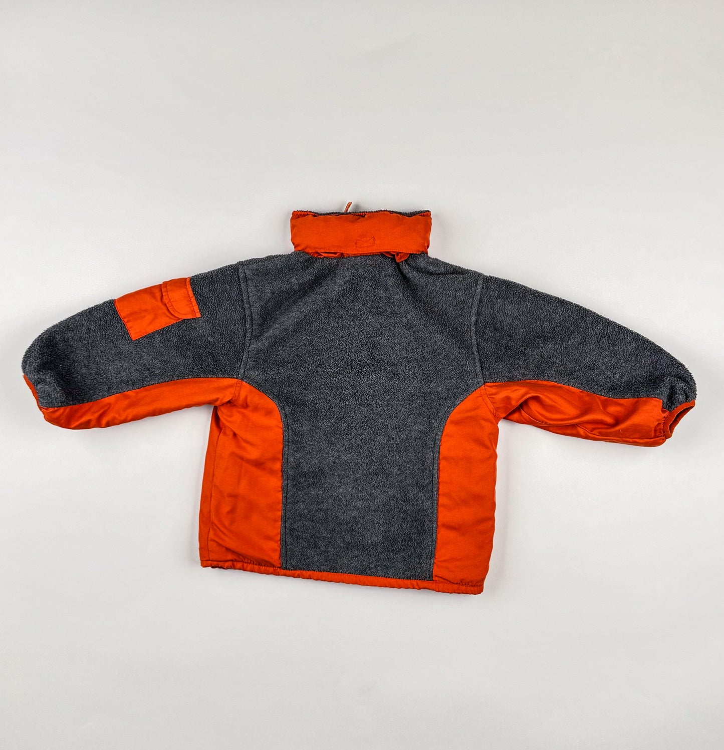Fleece jackets in grey, orange
