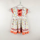 Dresss in white and orange and red and multi