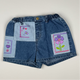 Denimshort in blue, pink and purple