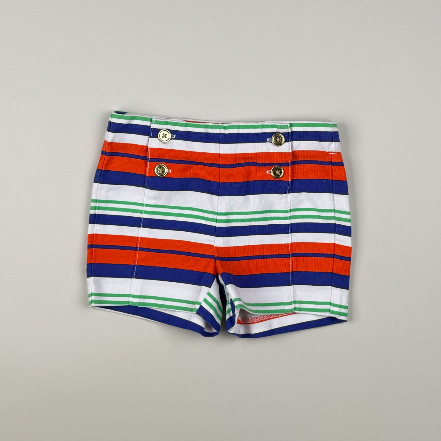 Short in red, blue, white and green