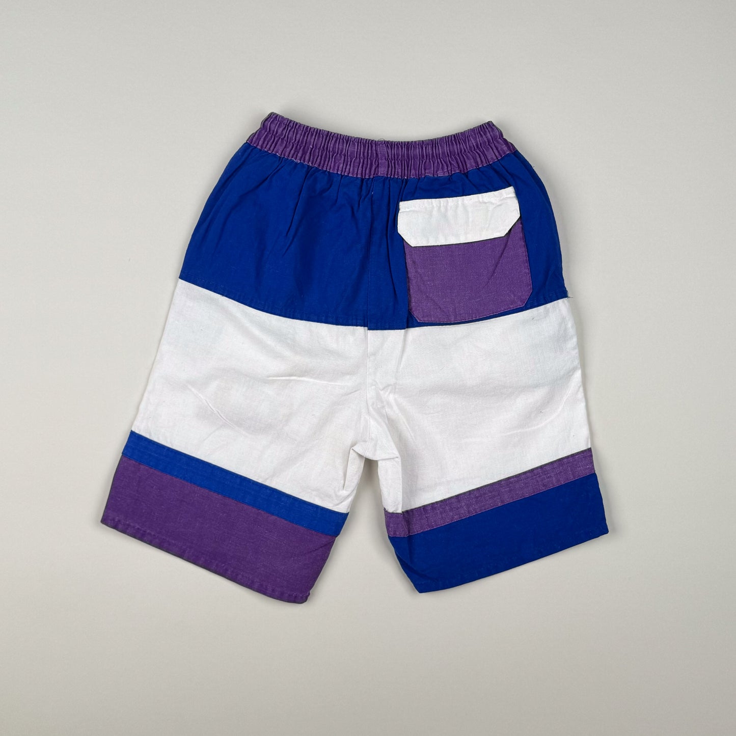 Short in blue, white and purple