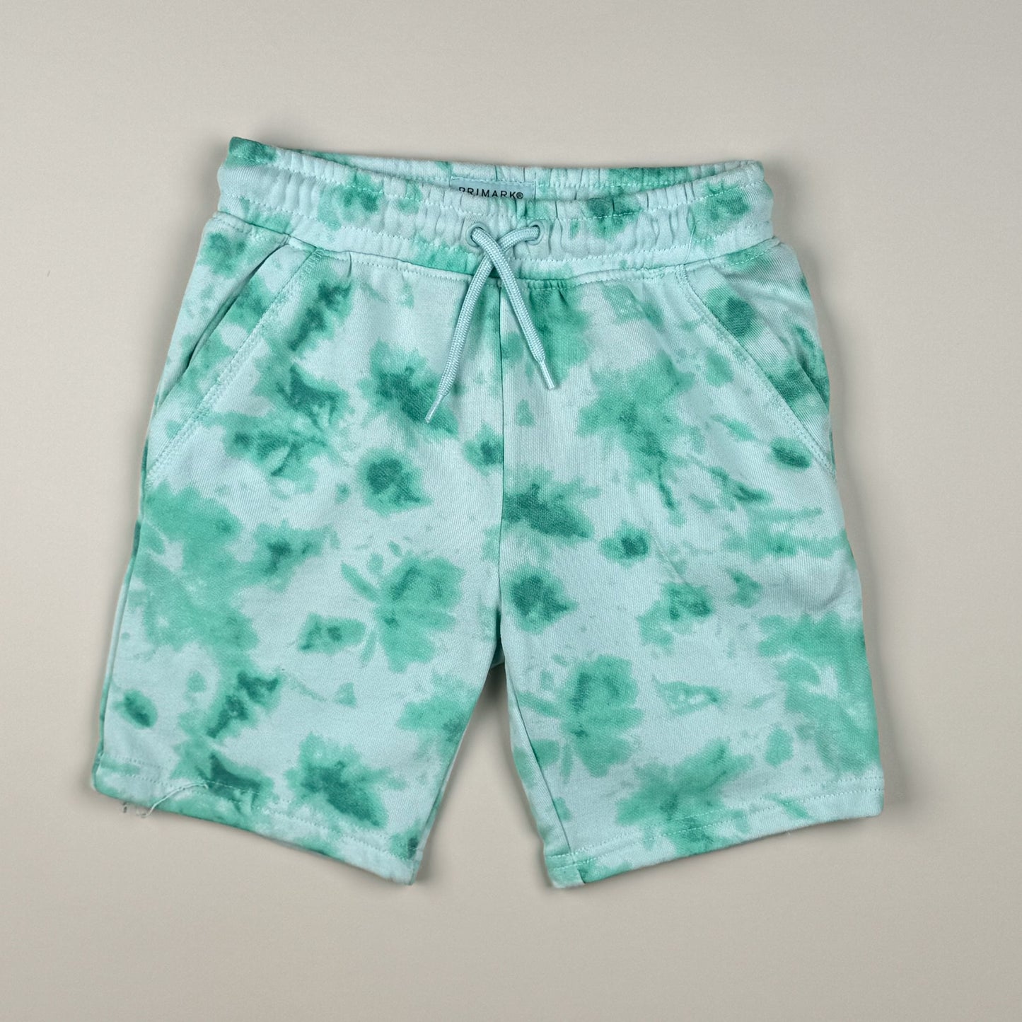 Short in blue and green