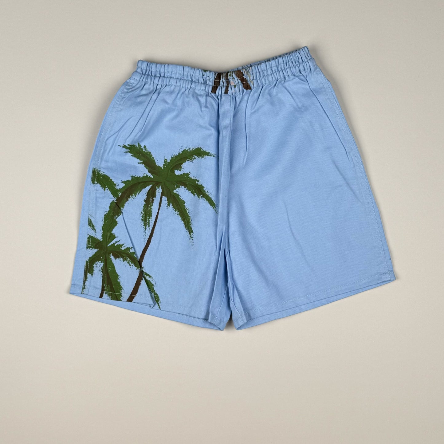 Short in green and blue