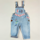 Overalls in blue, red and white