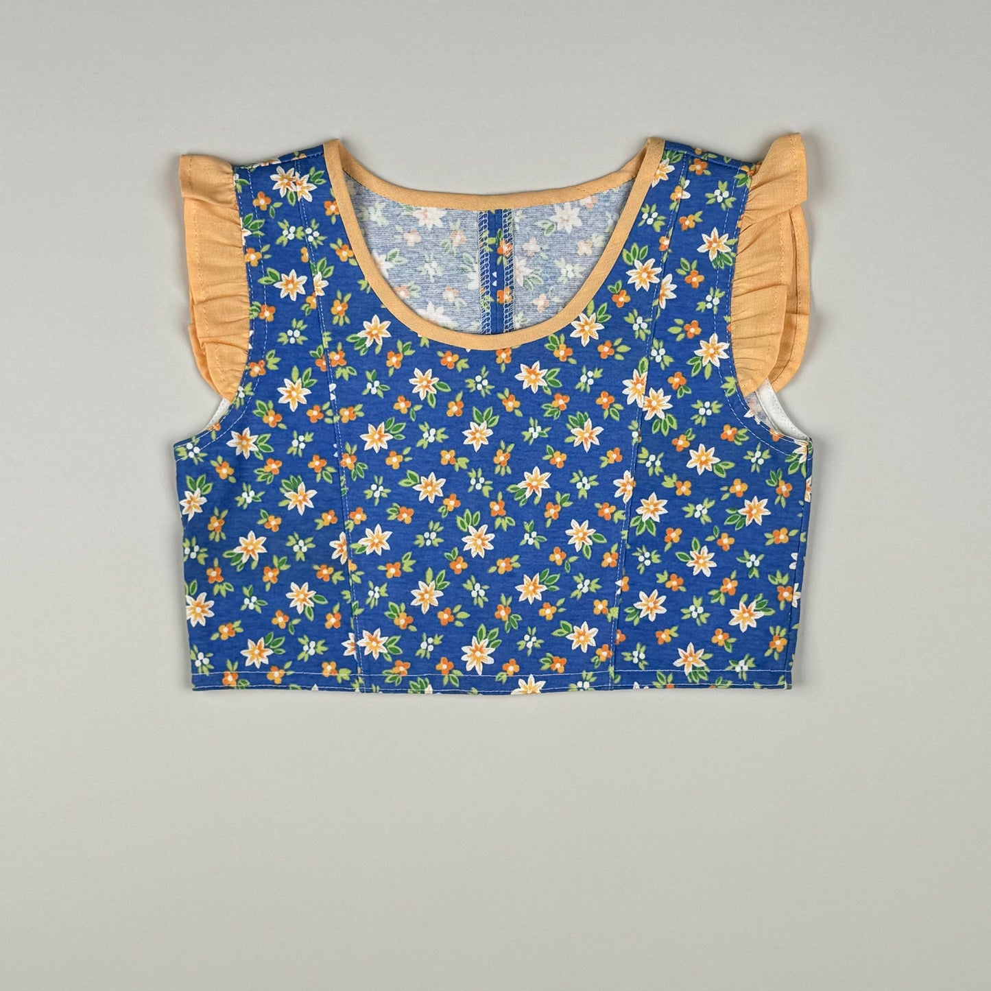 Top in blue and multi