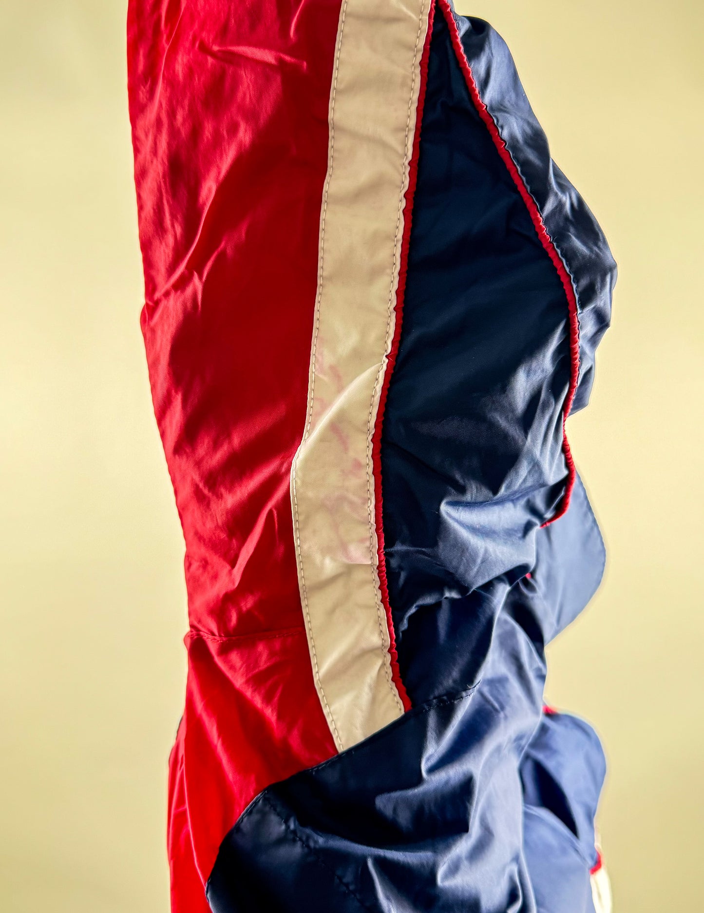 Windbreaker in blue, red and white