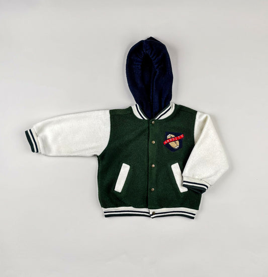 Fleece jackets in green, white, blue