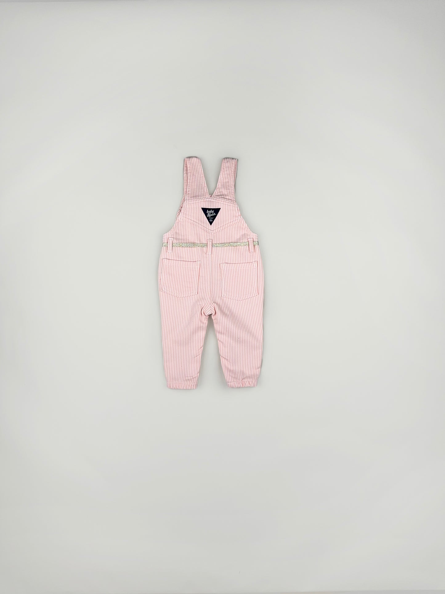 Overall in pink and white