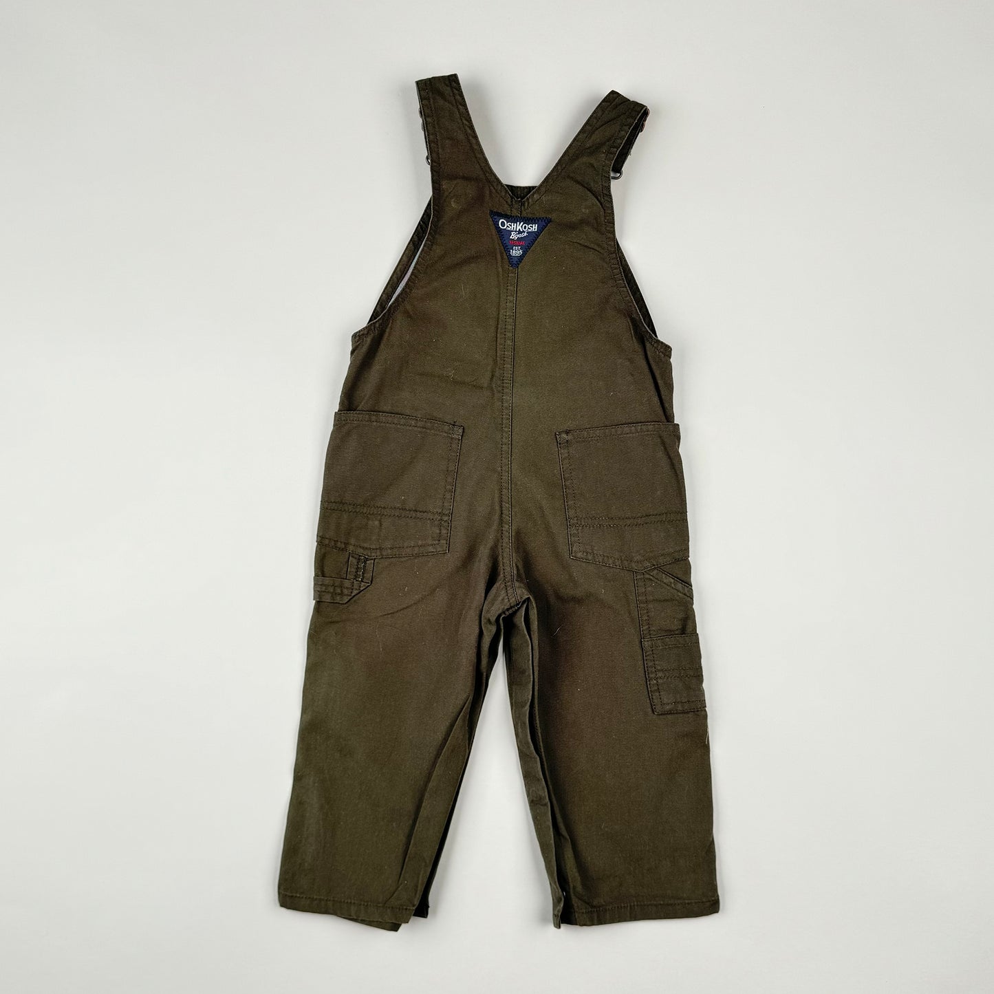 Overall in green and khaki