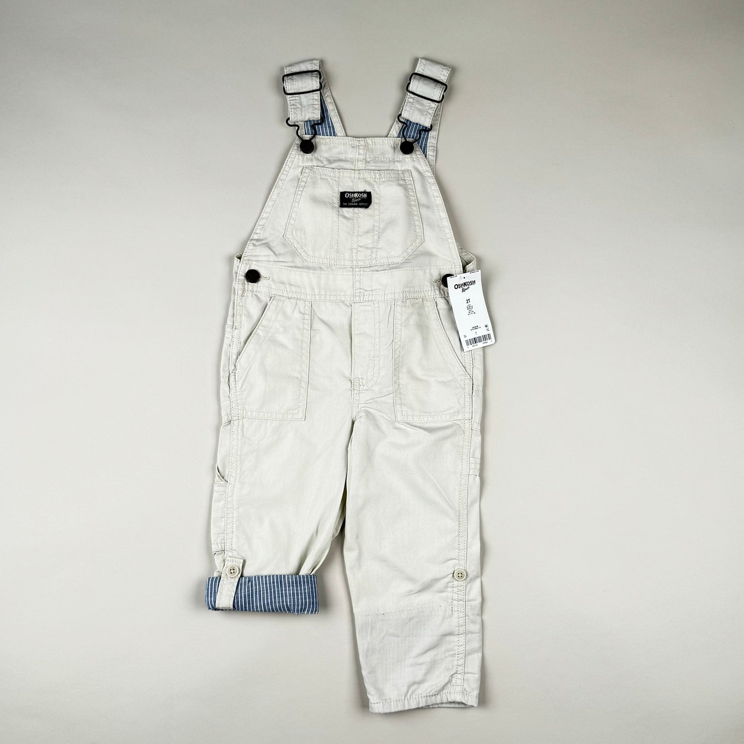 Overall in beige, blue and white