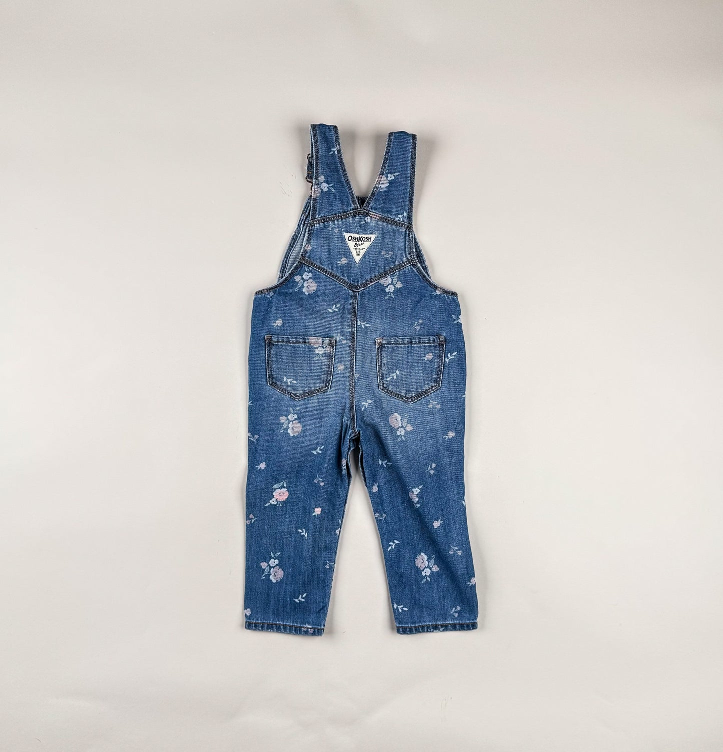 Overalls in blue, white and pink