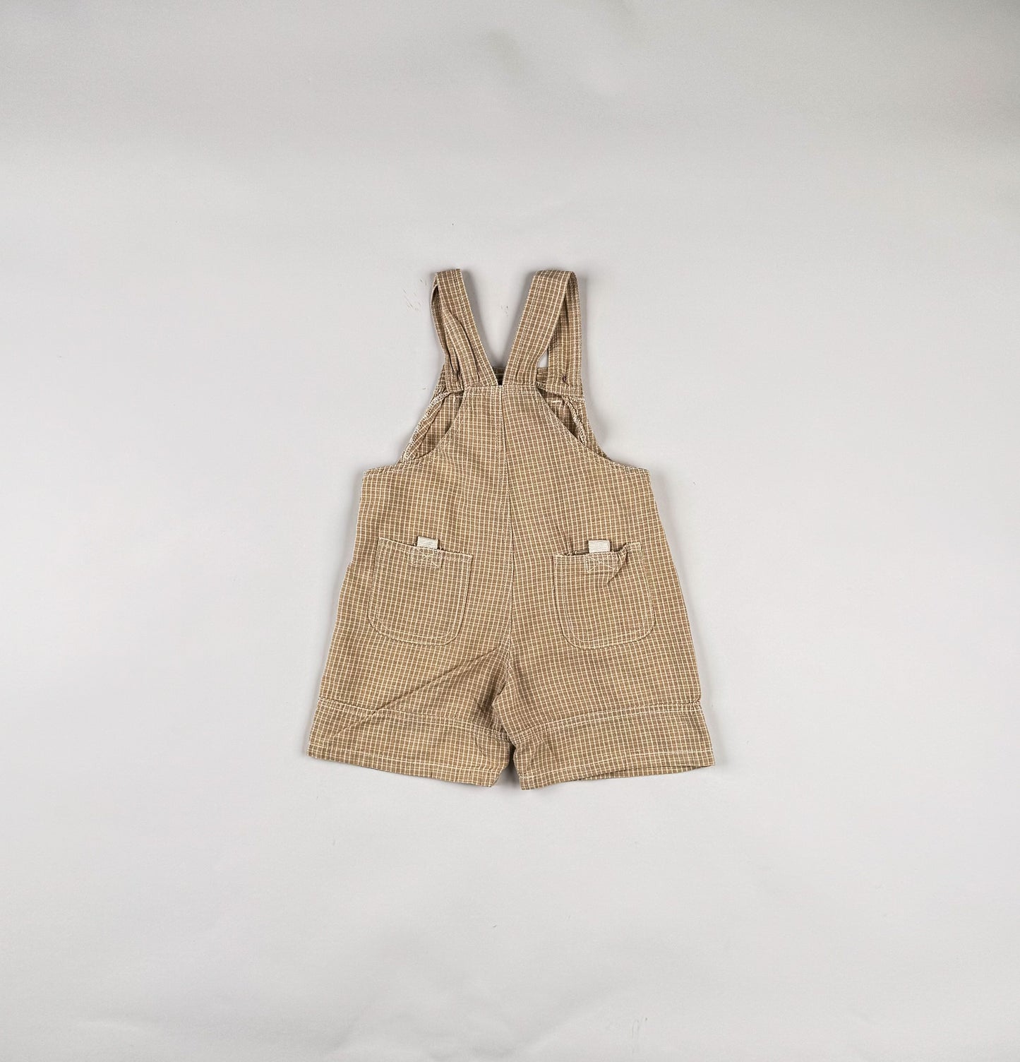 Shortalls in beige and white