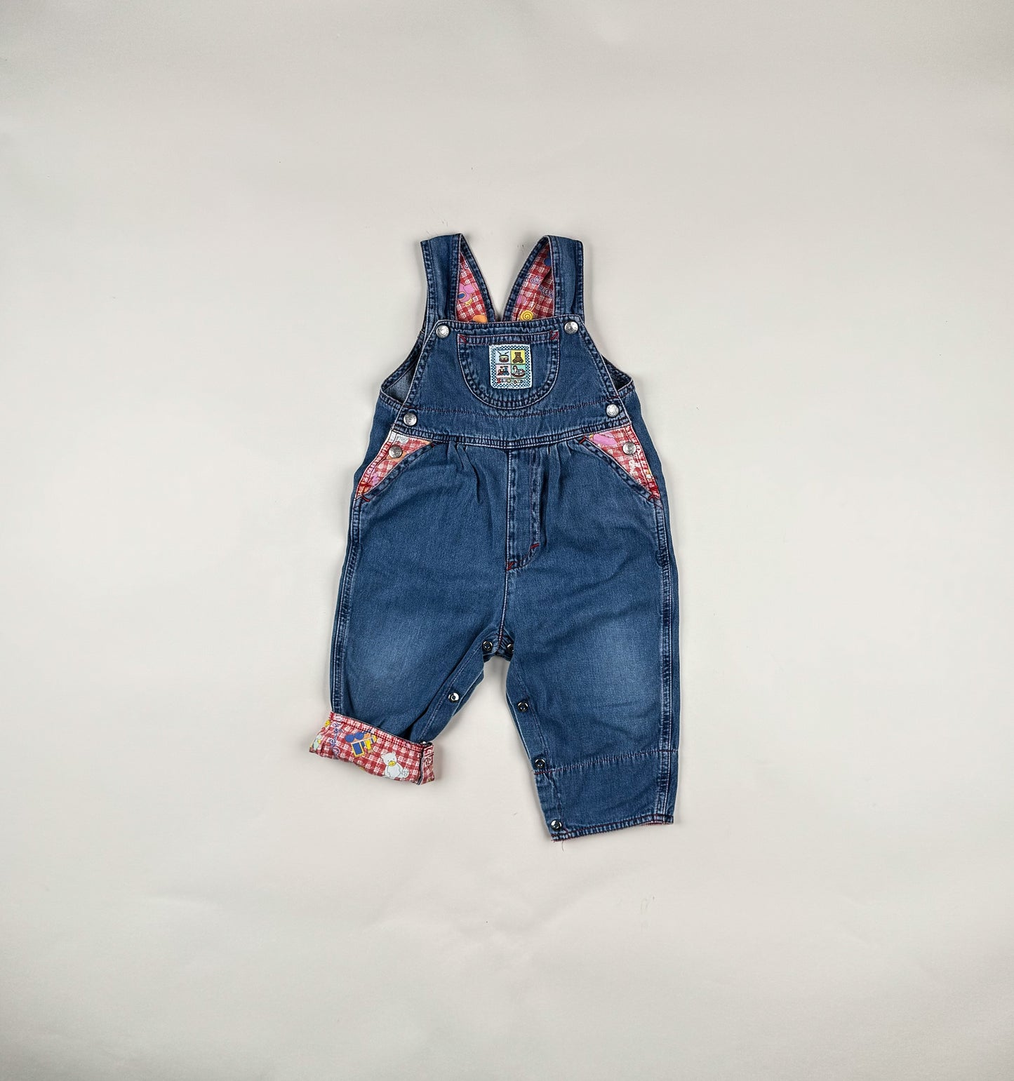 Overalls in blue, red and multi