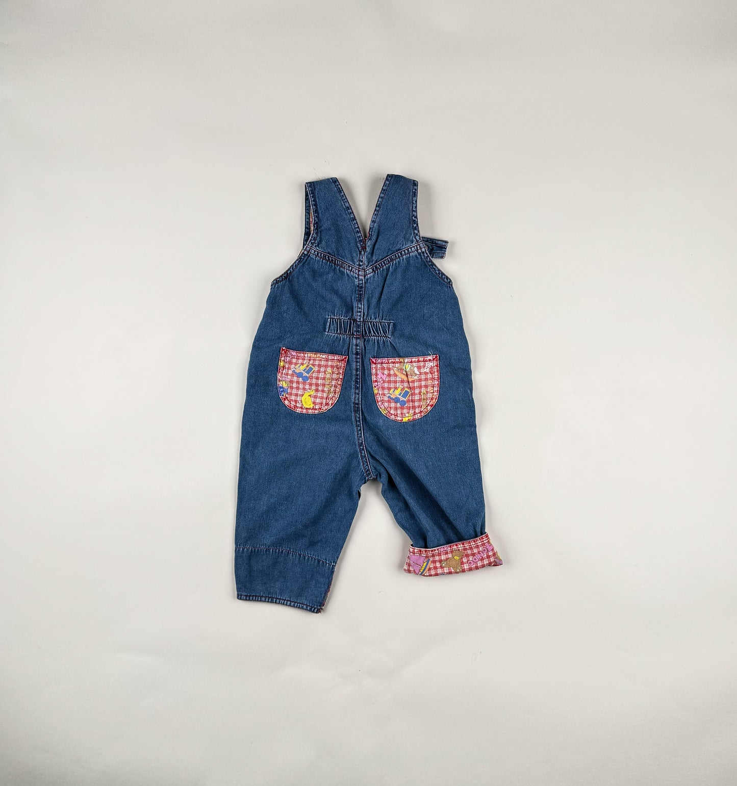 Overalls in blue, red and multi