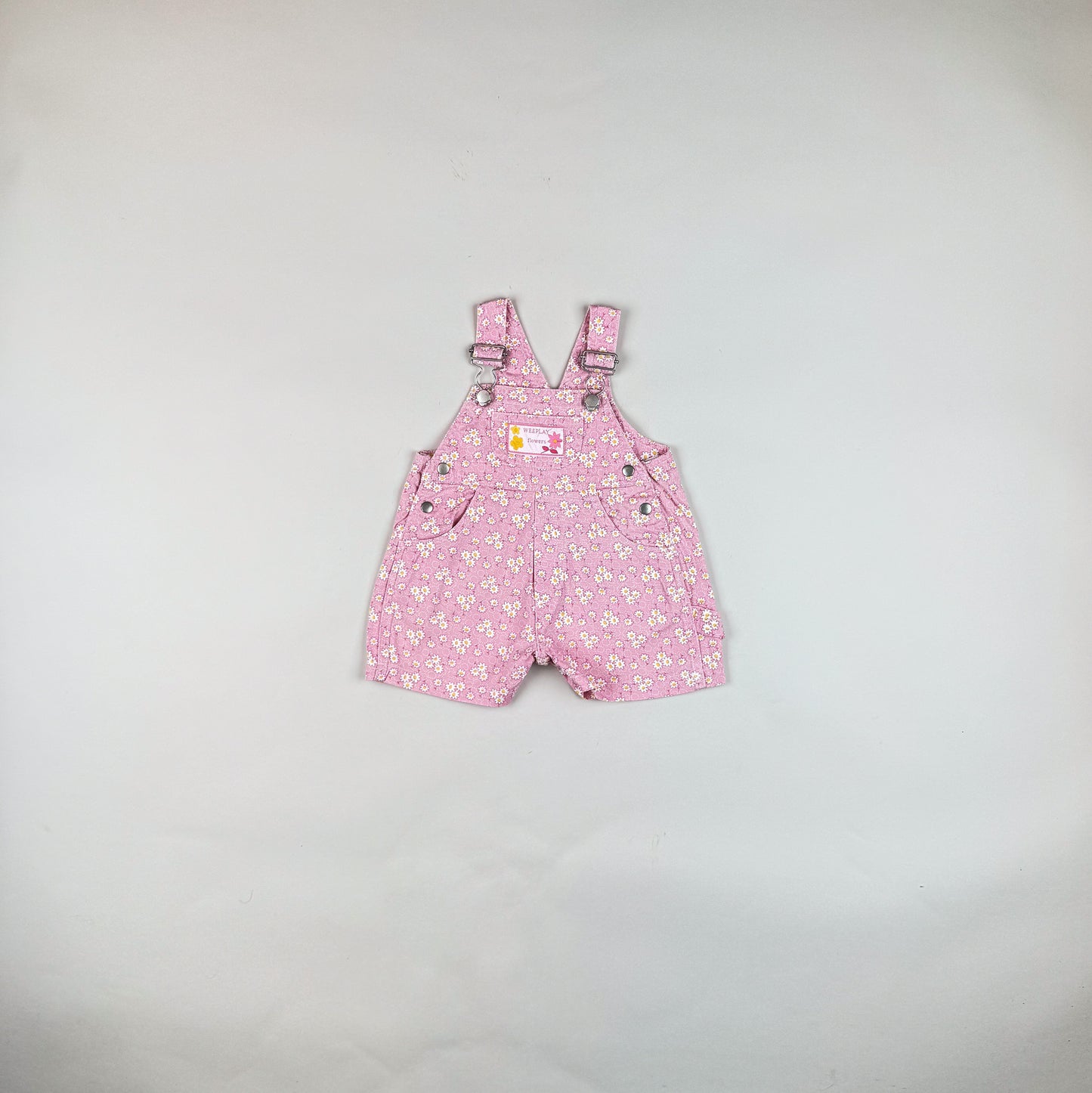 Shortalls in pink, white and yellow