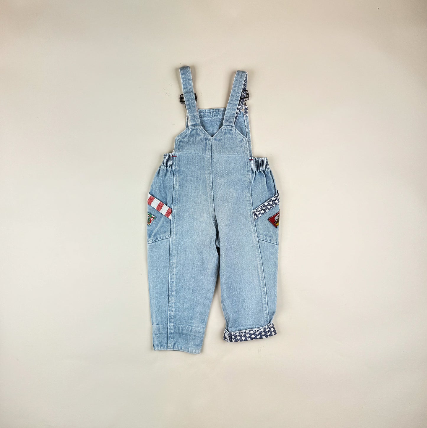 Overalls in blue, red and white