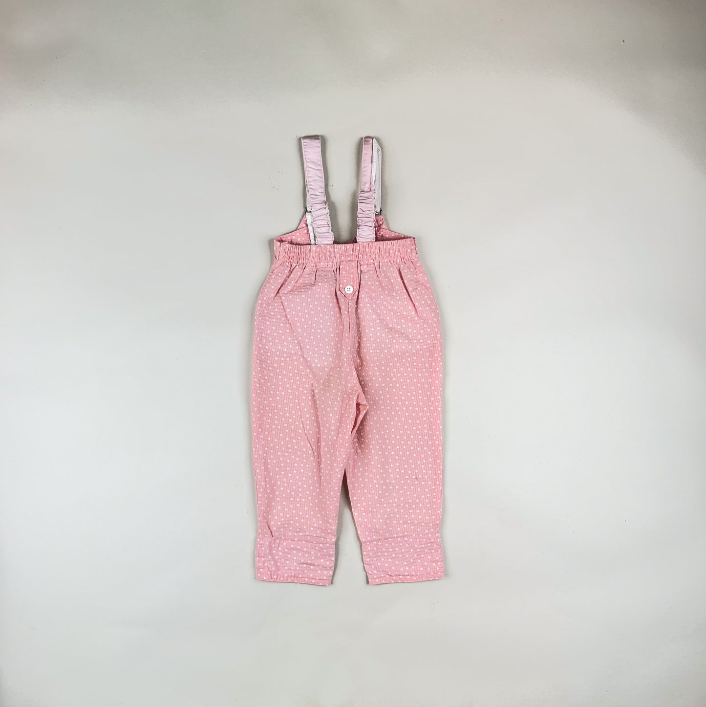 Overalls in pink and white