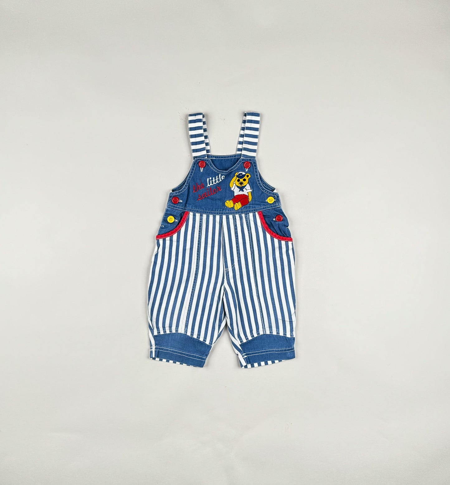 Overalls in blue, white and red