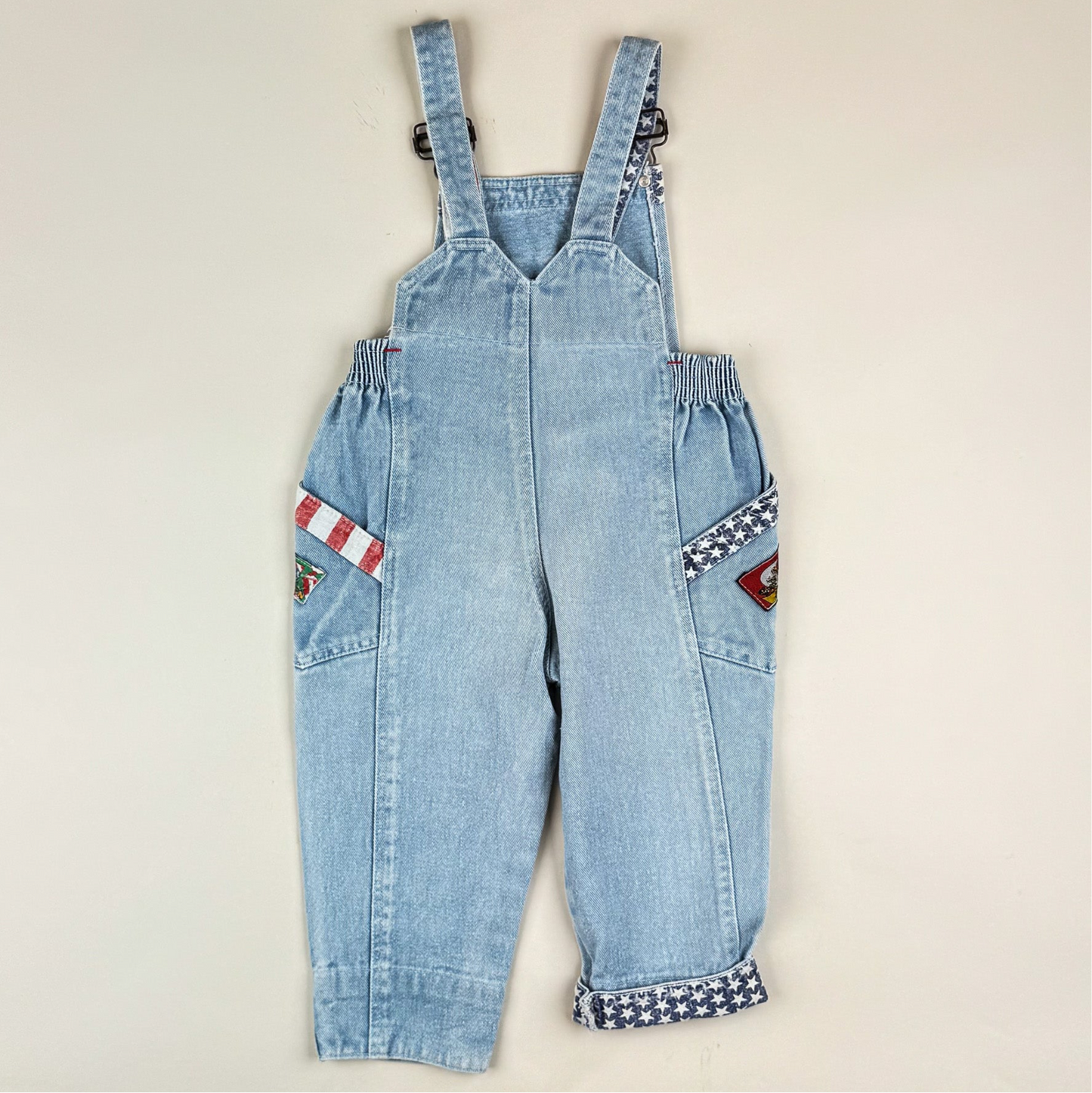 Overalls in blue, red and white